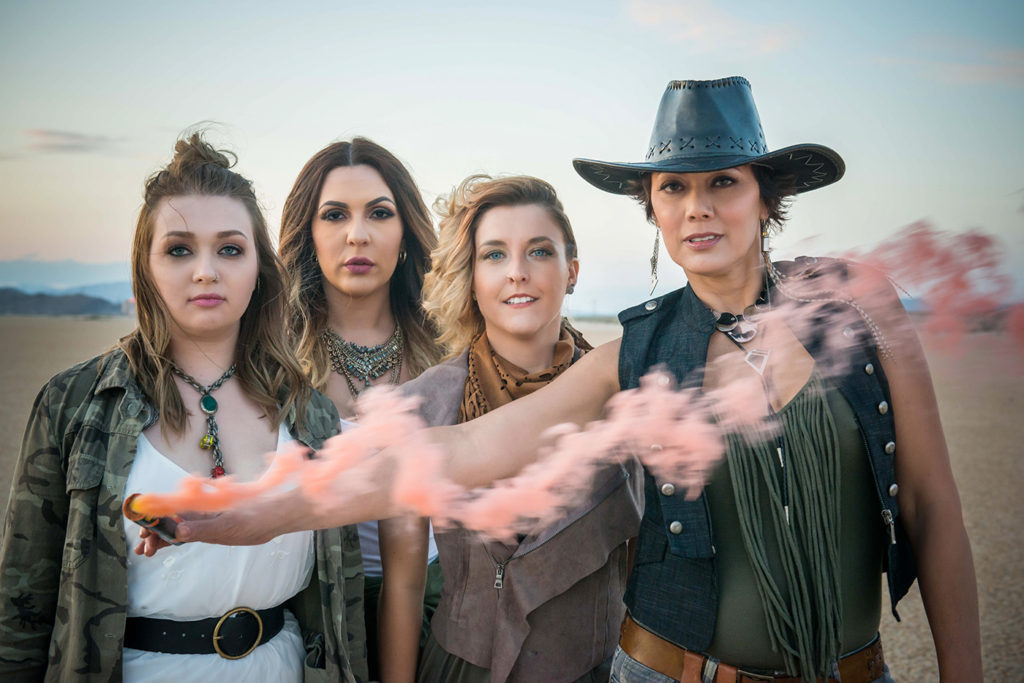 Group of women with a smoke bomb